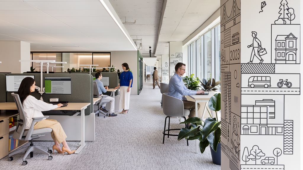 A group of people in an office.