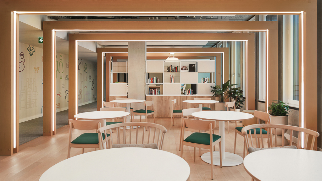 A room with tables and chairs.