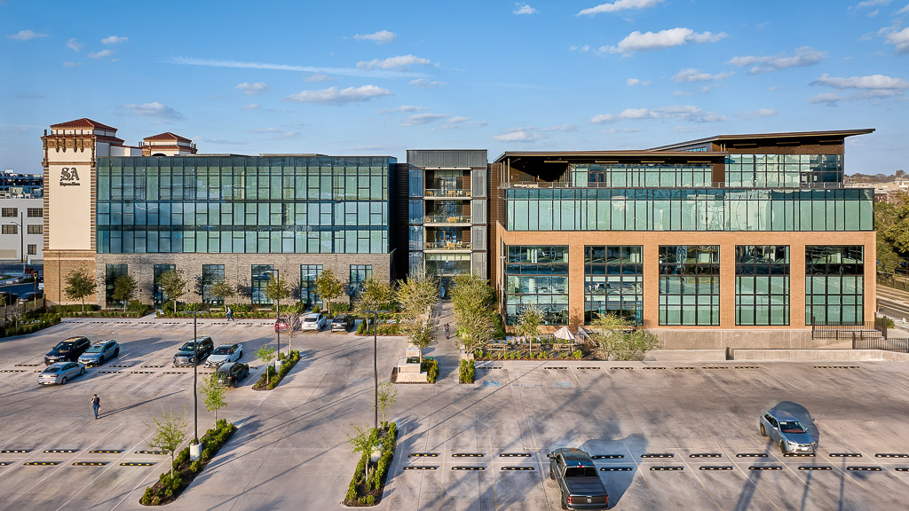 A building with a parking lot.