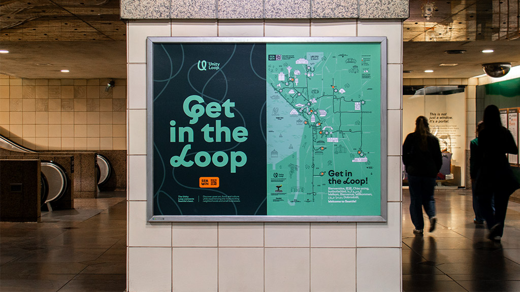 A large green sign in a building.