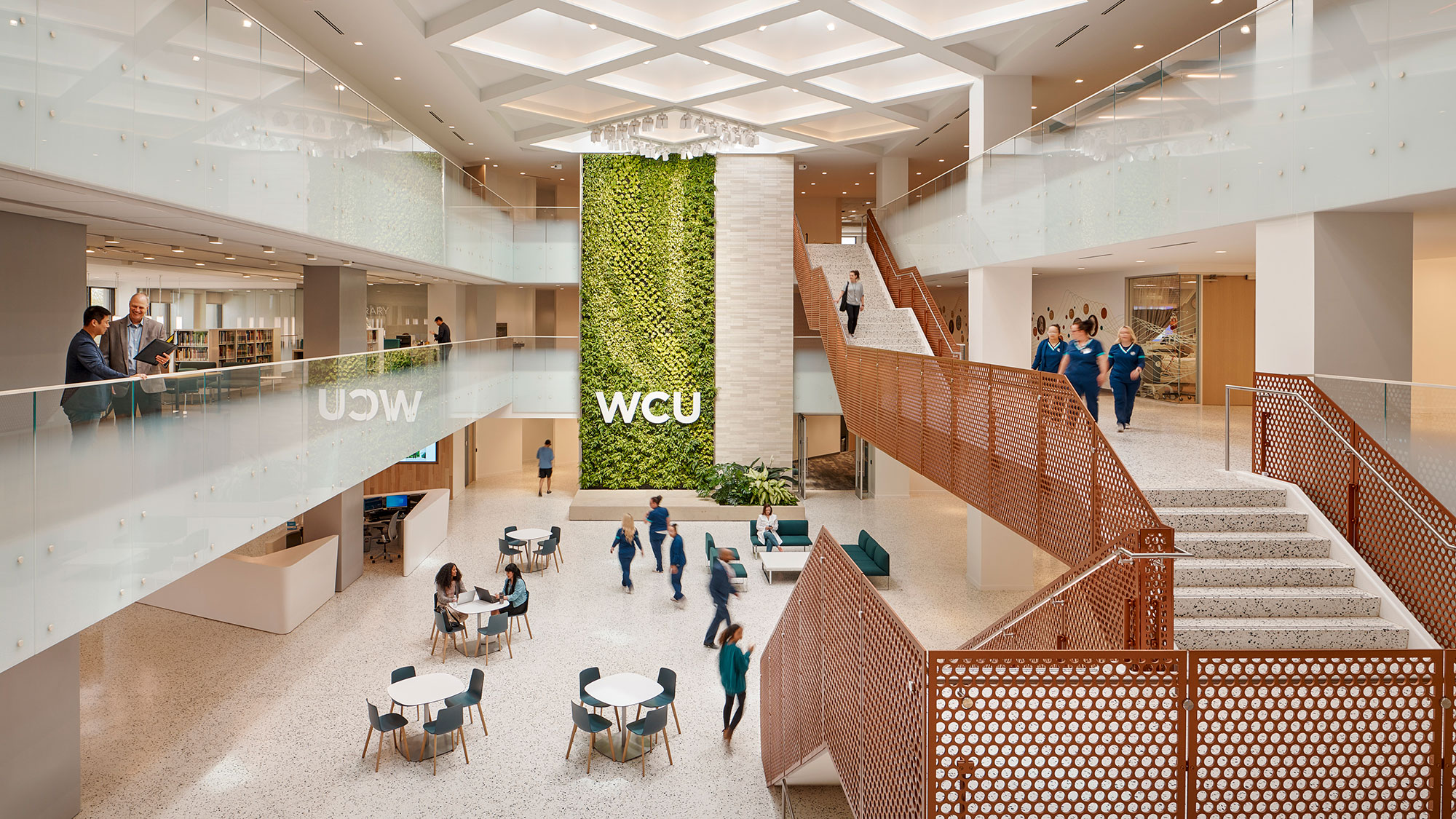 A group of people in a building.