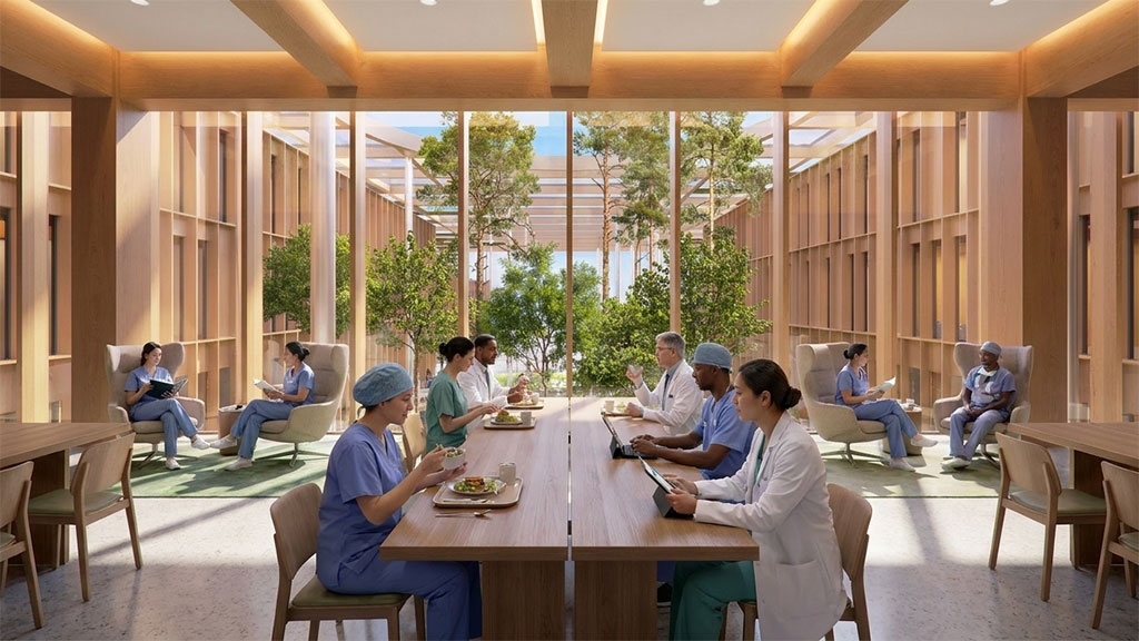 A group of people sitting around a table eating food.
