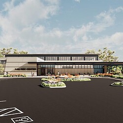 A building with a parking lot.