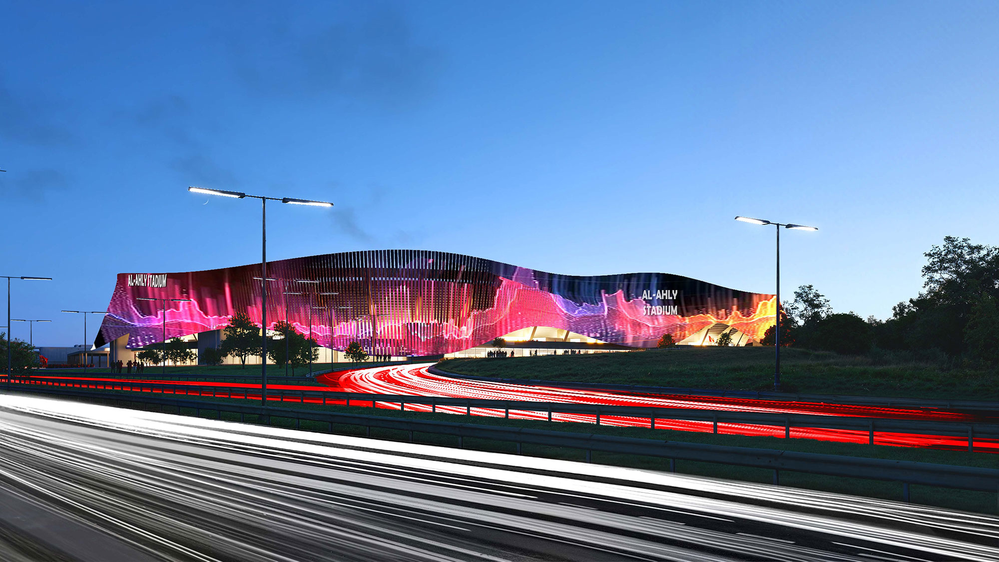 A stadium with lights on.