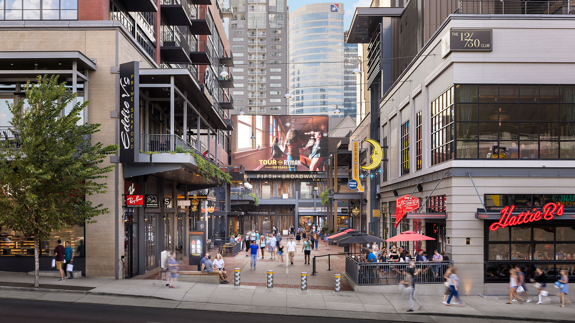 A city street with people walking.