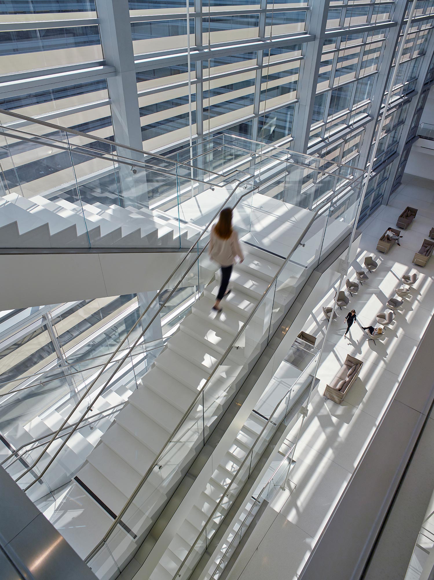 A person walking on a walkway.