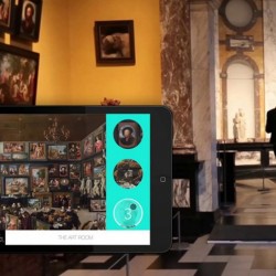 A person standing next to a display.