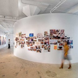 A person walking in a museum.