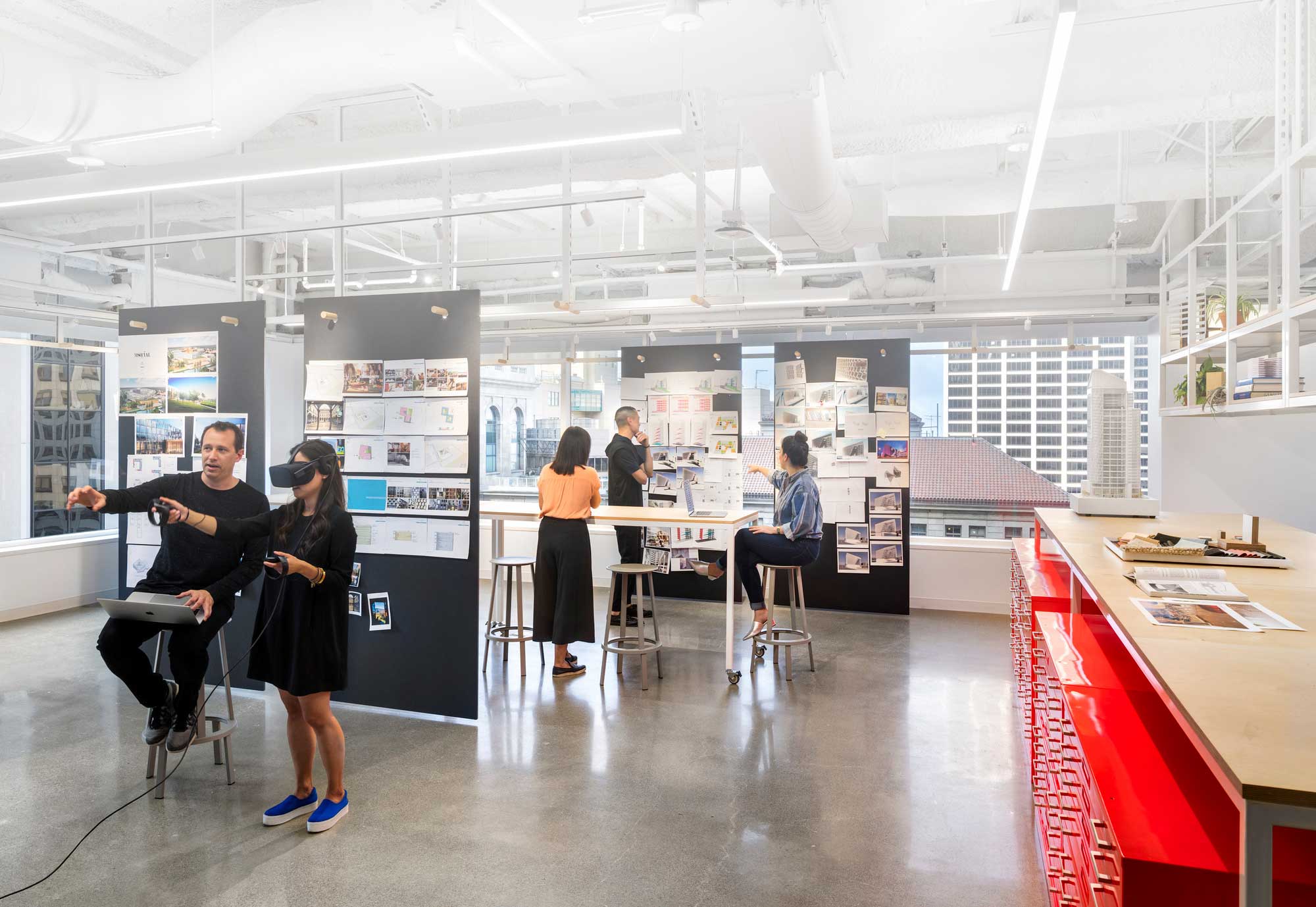 A group of people in an office.