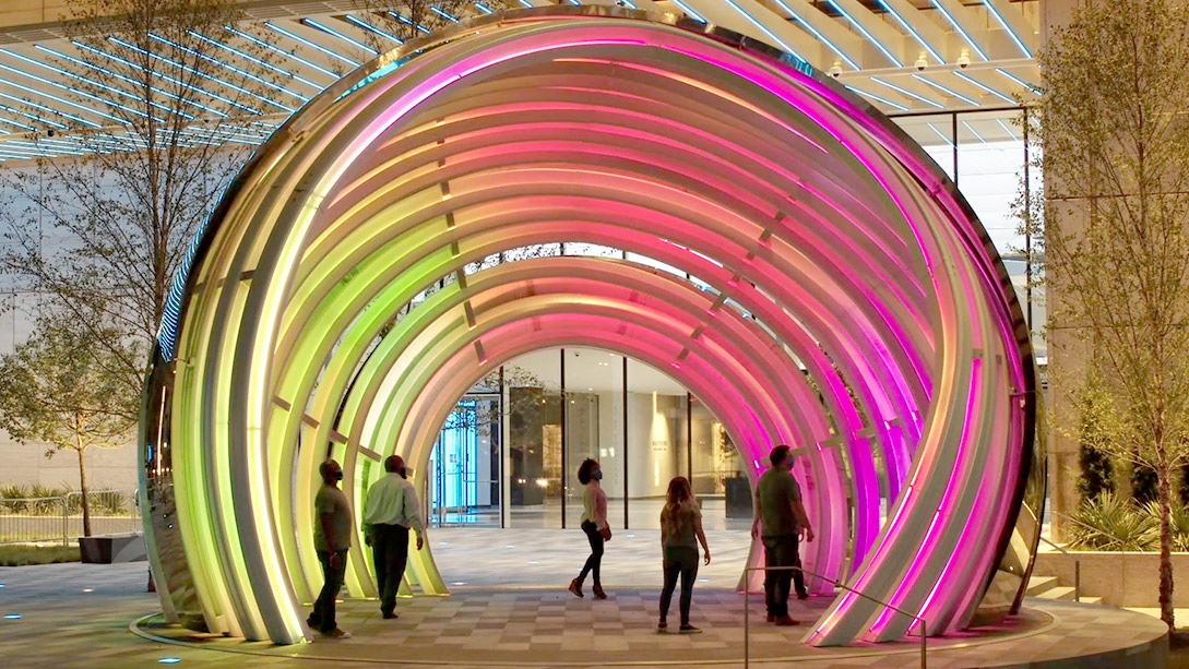 People walking in a large building.