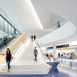 SFO Harvey B. Milk Terminal 1 staircase and escalator.