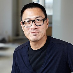 A man wearing glasses.