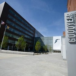 A building with a sign in front.