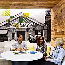 A group of people sitting at a table.