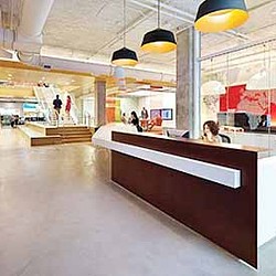 A large room with people and a counter.