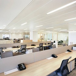 An office with a large table.