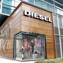 A store front with a sign.