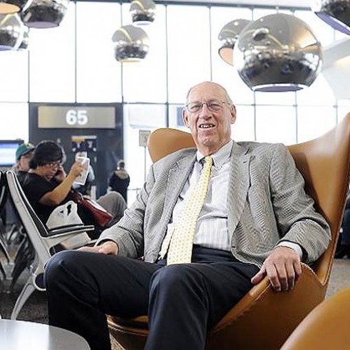 A man sitting in a chair.
