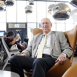 A man sitting in a chair.