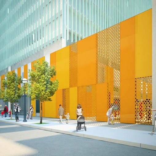 A group of people walking outside of a building.