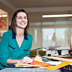 A woman smiling at the camera.