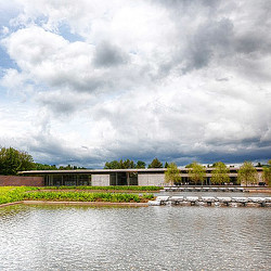 A building next to a body of water.