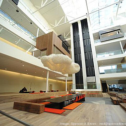 A large wooden sculpture in a building.