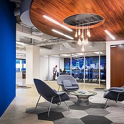 A room with chairs and a table.