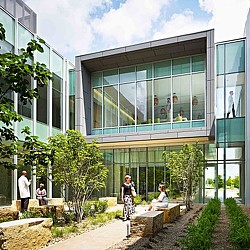 A group of people outside of a building.