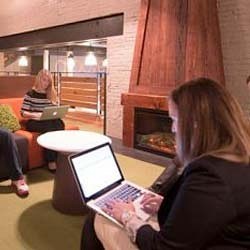 A person using a laptop.