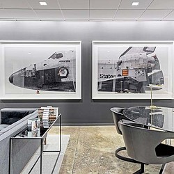 A room with a table and chairs.