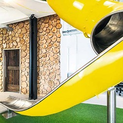 A yellow and black blow dryer.