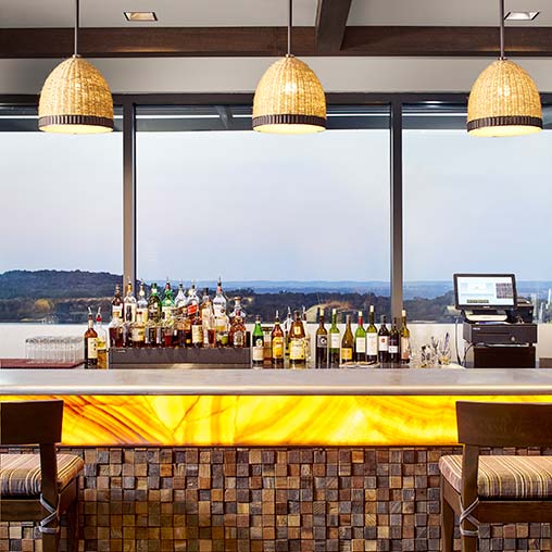 A bar with a large window.
