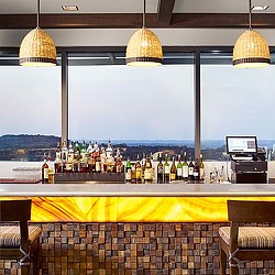 A bar with a large window.