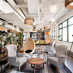 A room with chairs and tables.