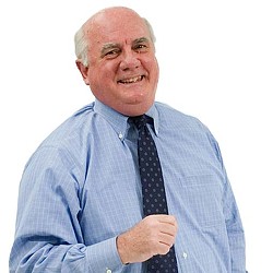 A man in a blue shirt and tie.