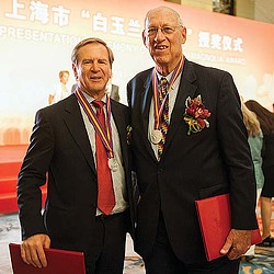 A couple of men in suits.