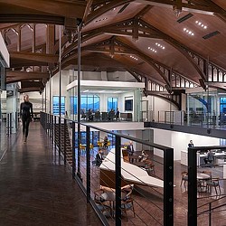 A large room with tables and chairs.
