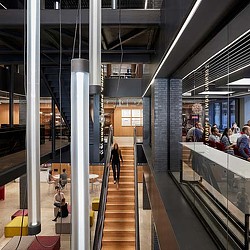 A group of people in a building.