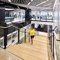 A person walking in a large room.