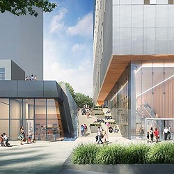 A group of people outside of a building.