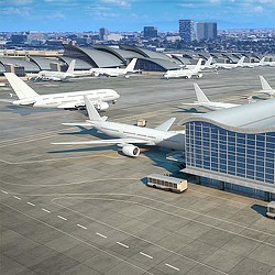Airplanes parked in a terminal.