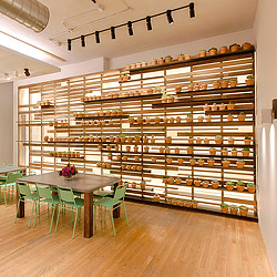 A room with a table and chairs.