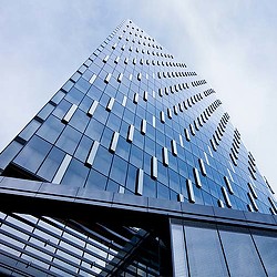 A tall building with many windows.