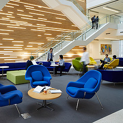 People sitting at tables in a room.