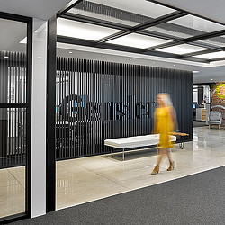 A person walking in a room.