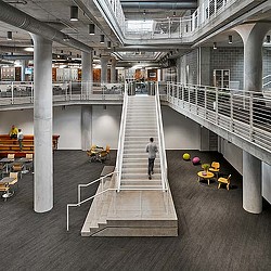 A person walking up a flight of stairs.