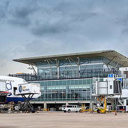 A large building with a parking lot.