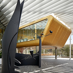 A room with a large glass window.