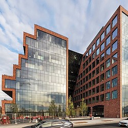 A few buildings with a street in front of them.